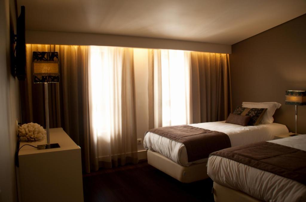 Aqua Ria Boutique Hotel Faro Bilik gambar