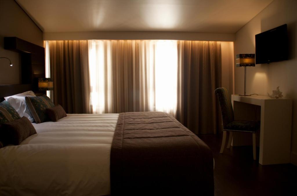 Aqua Ria Boutique Hotel Faro Bilik gambar